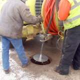 Mosmatic Manhole cleaner cleaning manhole