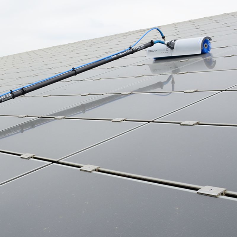 Solar panel cleaning kit with brush and pole
